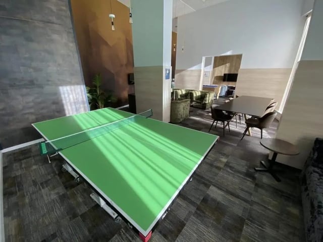 Ping pong table seating and tables common area at The View - Newcastle in Newcastle Upon Tyne Student Accommodation