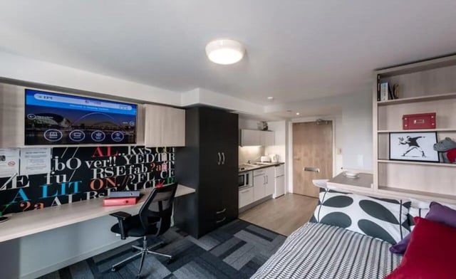 Desk TV kitchen wardrobe bed study area at The View - Newcastle in Newcastle Upon Tyne Student Accommodation
