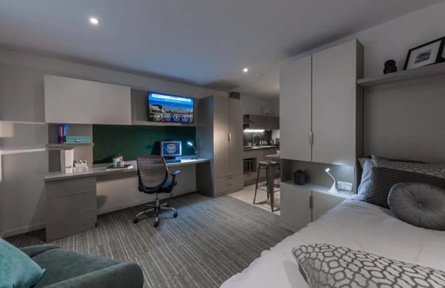 Desk chair TV kitchen bed and desk study area at Verde in Newcastle Upon Tyne Student Accommodation