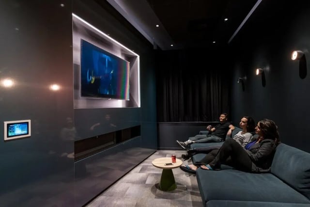 Sofa tablet TV screen people watching cinema room at Verde in Newcastle Upon Tyne Student Accommodation