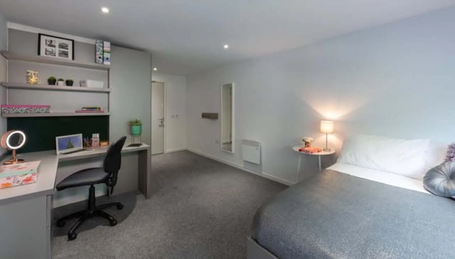 Desk mirror laptop bed and shelves bedroom at Verde in Newcastle Upon Tyne Student Accommodation