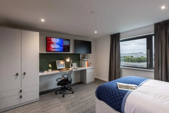 Wardrobe desk computer chair and bed bedroom at West View in Glasgow Student Accommodation