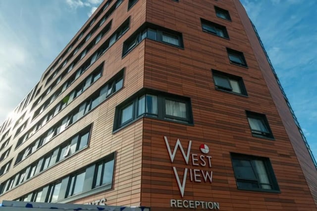 Modern brick building with many windows exterior at West View in Glasgow Student Accommodation