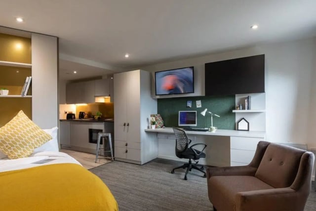 Bed kitchen desk and chair living area at West View in Glasgow Student Accommodation