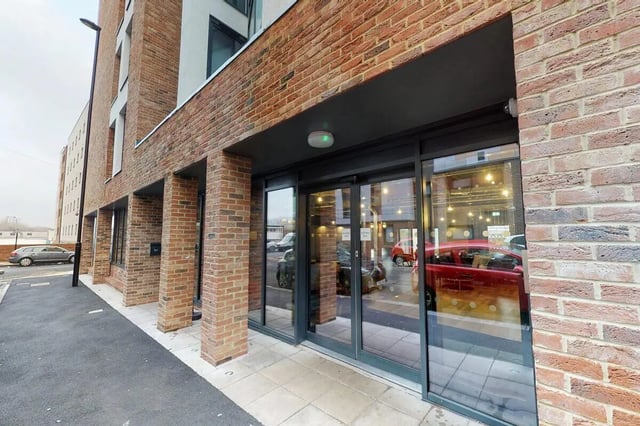 Glass doors brick building exterior at The Bridge in Newcastle Upon Tyne Student Accommodation