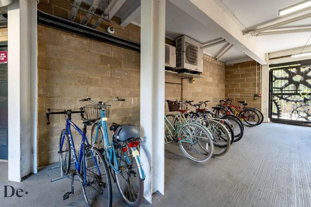 Bicycles in racks exterior storage area at Castle Hill in Cambridge Student Accommodation