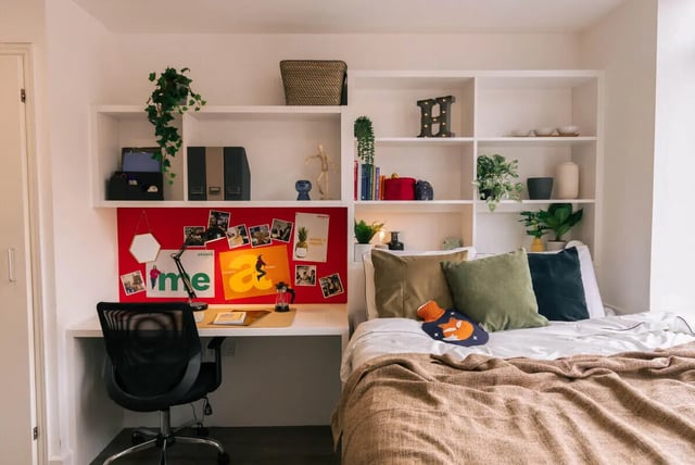 Desk chair bed with pillows and hot water bottle bedroom at Stonebridge House in Bristol Student Accommodation