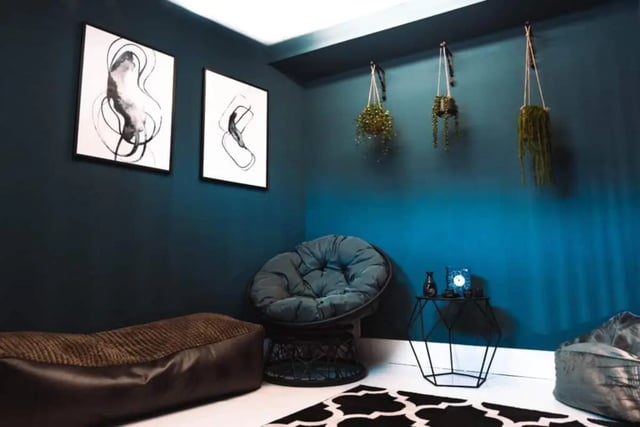 Bean bag abstract art hanging plants living room at Stonebridge House in Bristol Student Accommodation