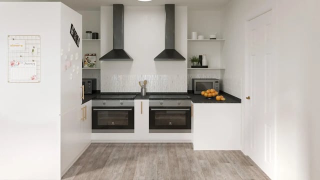Modern kitchen with two ovens and a microwave kitchen at New North Road in Exeter Student Accommodation