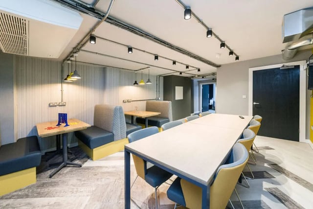 Booths long table Connect Four game Common area at Quayside Court in Newcastle Upon Tyne Student Accommodation