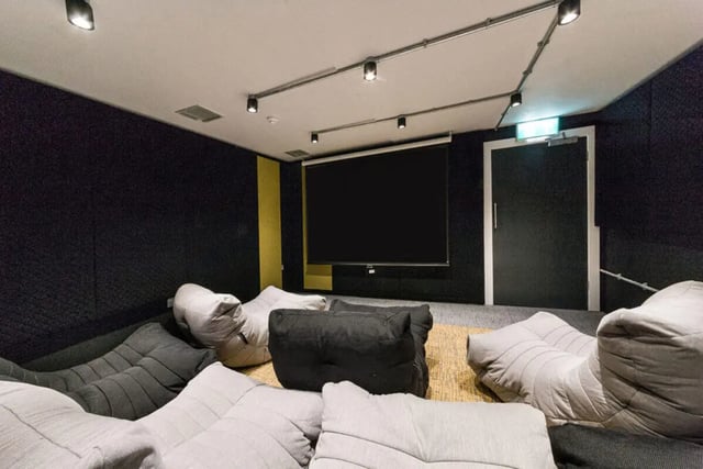 Beanbag chairs surround large projector screen playing area at Quayside Court in Newcastle Upon Tyne Student Accommodation