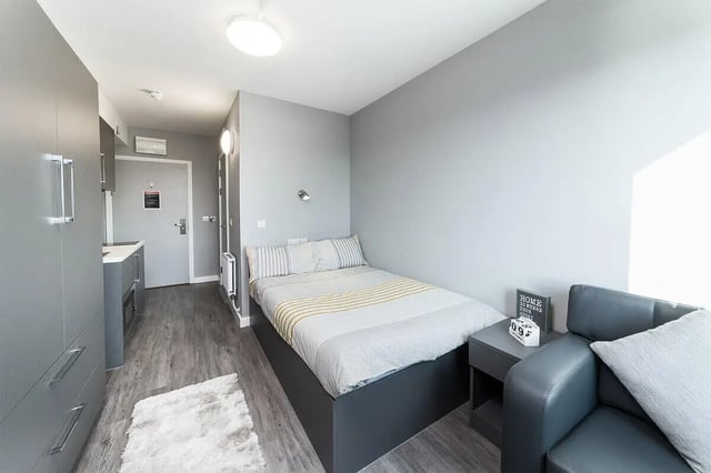Bed kitchen wardrobe sofa bedroom at Quayside Court in Newcastle Upon Tyne Student Accommodation
