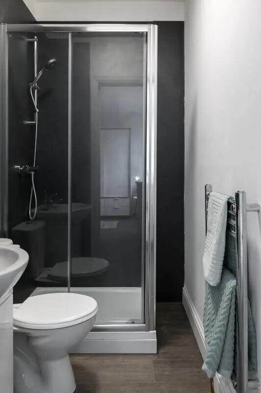 Toilet sink shower with glass door bathroom at Holgate Road in York Student Accommodation
