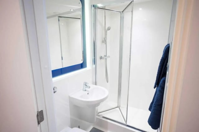 Sink mirror shower and towel bathroom at Hox Park in Egham Student Accommodation