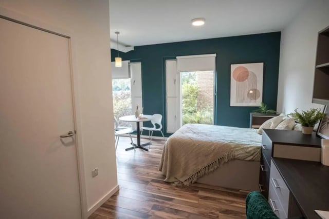 Bed table and chairs bedroom interior at Hox Park in Egham Student Accommodation