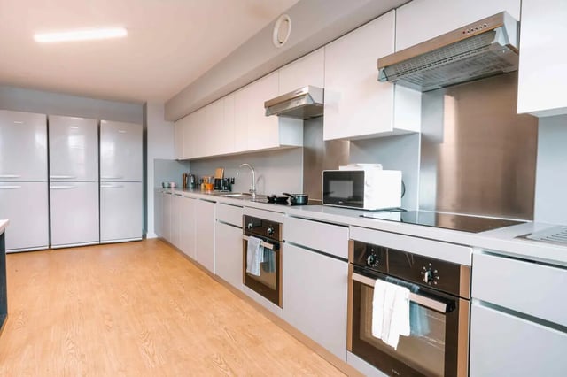 Four fridges ovens microwave modern kitchen at The Depot in Bath Student Accommodation