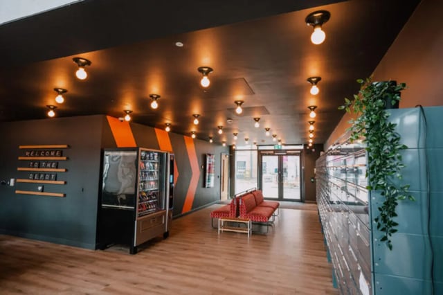 Vending machine couch lockers entrance common area at The Depot in Bath Student Accommodation