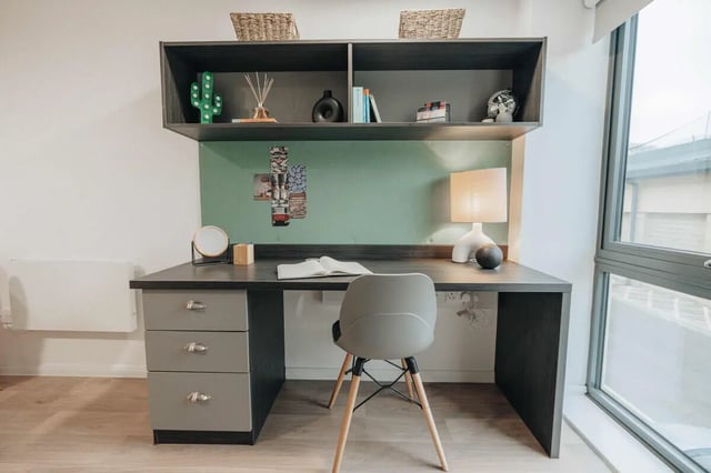 Desk with chair and lamp study area at Avon Studios in Bath Student Accommodation