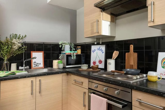 Sink microwave oven and stovetop kitchen at Exchange Works in Sheffield Student Accommodation