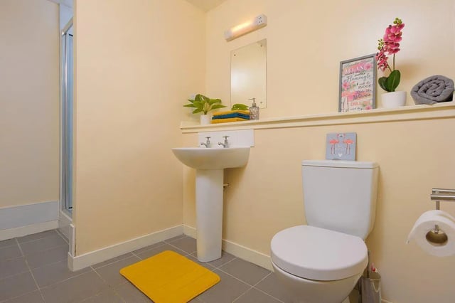 Toilet sink shower and decor student bathroom at Keiller Court in Dundee Student Accommodation