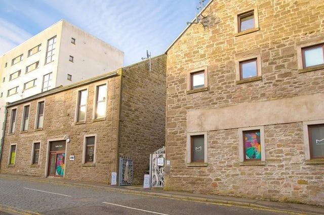 Stone buildings with windows exterior at Keiller Court in Dundee Student Accommodation