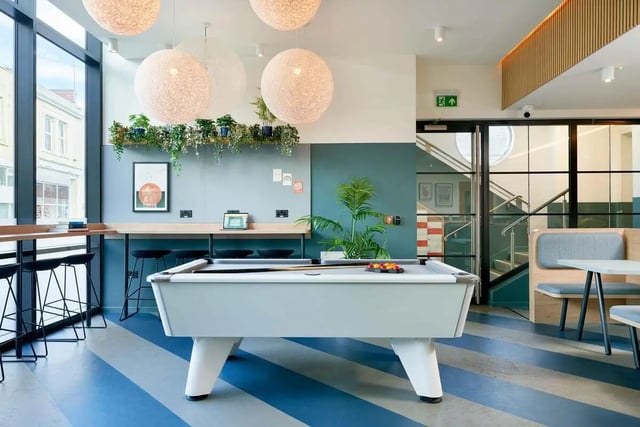 Pool table plants and seating area communal space at St Teresa House in Plymouth Student Accommodation