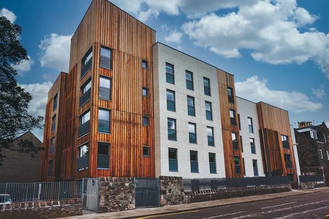 Modern building with wood and brick exterior exterior at King Street 403 in Aberdeen Student Accommodation