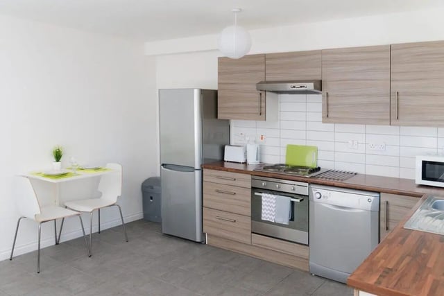 Fridge oven dishwasher table chairs kitchen at Linksfield in Aberdeen Student Accommodation