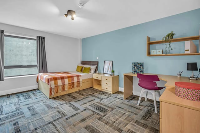 Bed desk and chair student bedroom at The Triangle in Leeds Student Accommodation