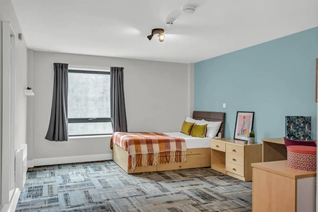 Bed with storage dresser and desk bedroom at The Triangle in Leeds Student Accommodation