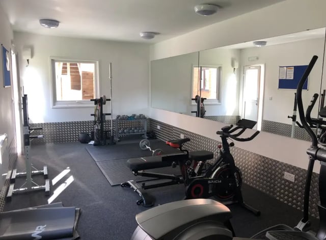Weight rack exercise bike bench and elliptical gym at Kingfisher Halls in Loughborough Student Accommodation