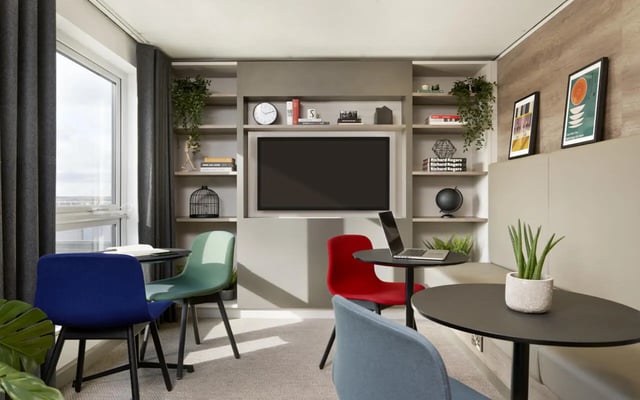 Modern student lounge with seating and TV study area at Student Castle Lincoln in Lincoln Student Accommodation