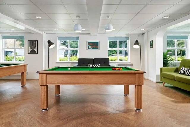 Pool tables sofa and artwork common area at Snow Island in Huddersfield Student Accommodation
