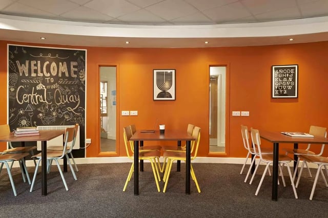 Tables chairs chalkboard welcome art communal area at Central Quay in Sheffield Student Accommodation