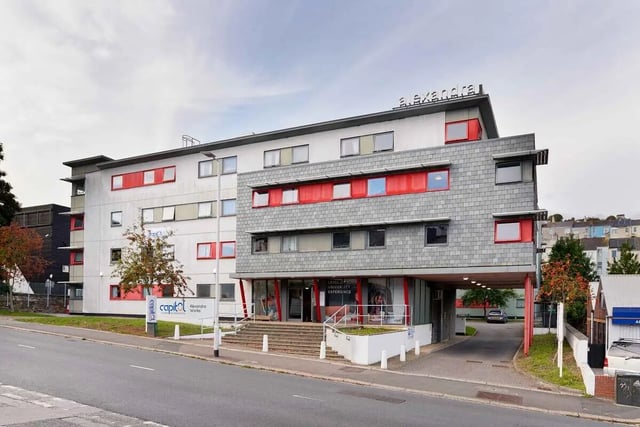 Modern building with red window frames exterior at Alexandra Works in Plymouth Student Accommodation