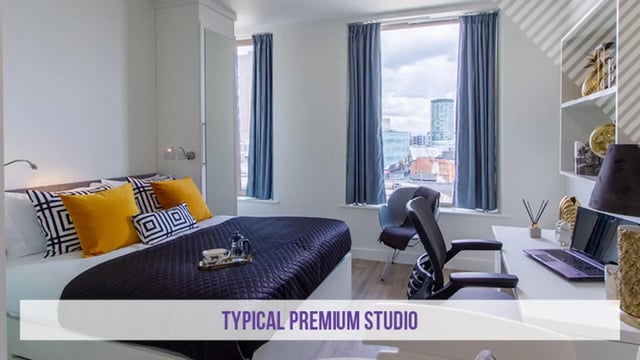 Bed desk chair and window typical studio bedroom at Kensington House in Birmingham Student Accommodation
