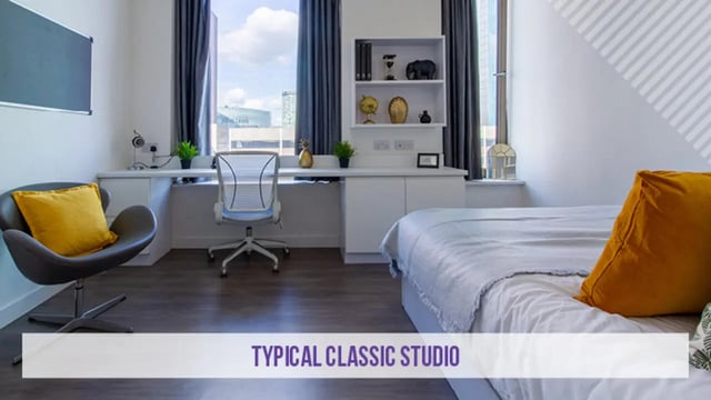 Bed desk chair shelves pillows bedding bedroom at Kensington House in Birmingham Student Accommodation