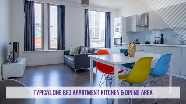 Sofa table chairs television kitchen dining area at Kensington House in Birmingham Student Accommodation