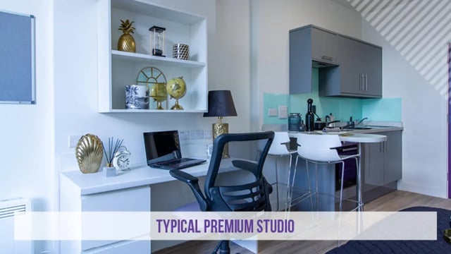 Desk laptop chair small kitchen studio apartment at Kensington House in Birmingham Student Accommodation