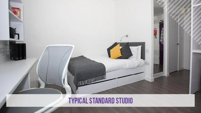 Bed desk chair shelves with folders bedroom studio at Kensington House in Birmingham Student Accommodation