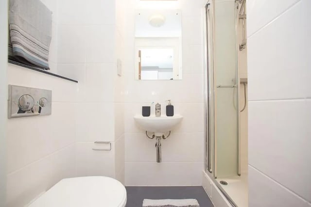 Toilet sink shower and towel bathroom at Primus Place in Leicester Student Accommodation