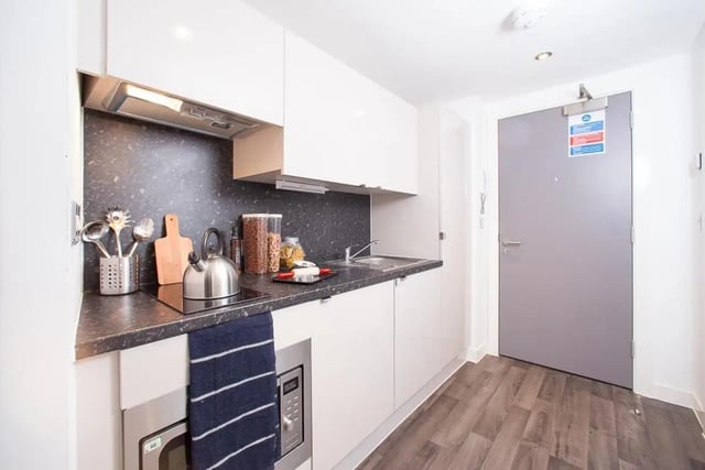 Kettle microwave utensils and cabinets kitchen at Primus Place in Leicester Student Accommodation