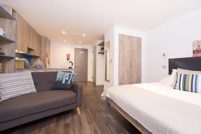 Sofa kitchen area bed wardrobe living room at Northgate Point in Chester Student Accommodation