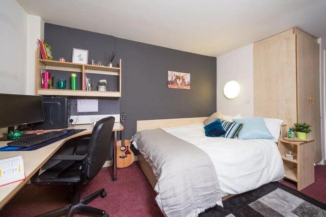 Desk bed shelving guitar closet bedroom at Aspect 3 Apartments in Sheffield Student Accommodation