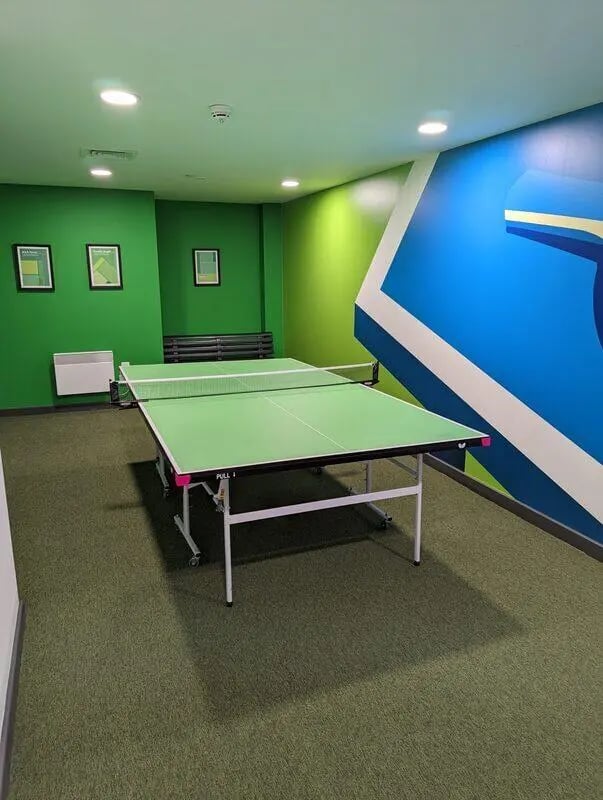 Ping pong table on green carpet playing area at Stanhope House Portsmouth in Portsmouth Student Accommodation
