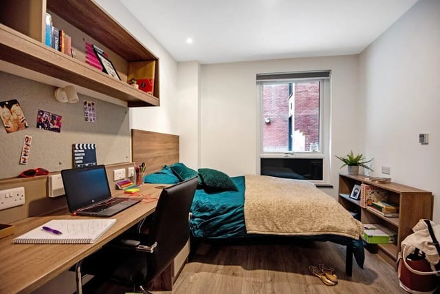 Desk laptop bed and bookshelf bedroom at Coppergate Swansea in Swansea Student Accommodation