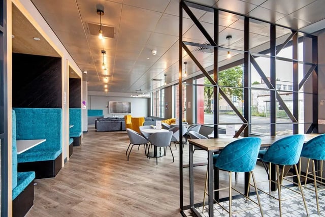 Booth seating tables and chairs communal area at Coppergate Swansea in Swansea Student Accommodation