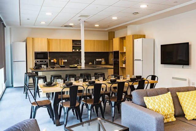Kitchen with island dining table and sofa. at Albany Student Village in Coventry Student Accommodation