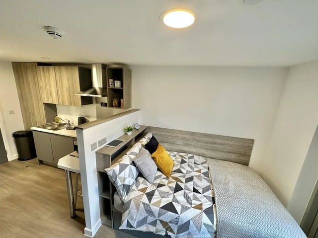 Studio apartment with bed kitchen and desk study area at Albany Student Village in Coventry Student Accommodation