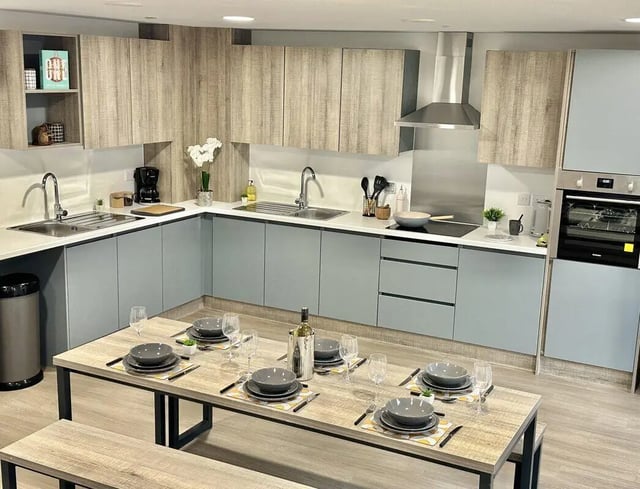 L-shaped kitchen with dining table kitchen at Albany Student Village in Coventry Student Accommodation